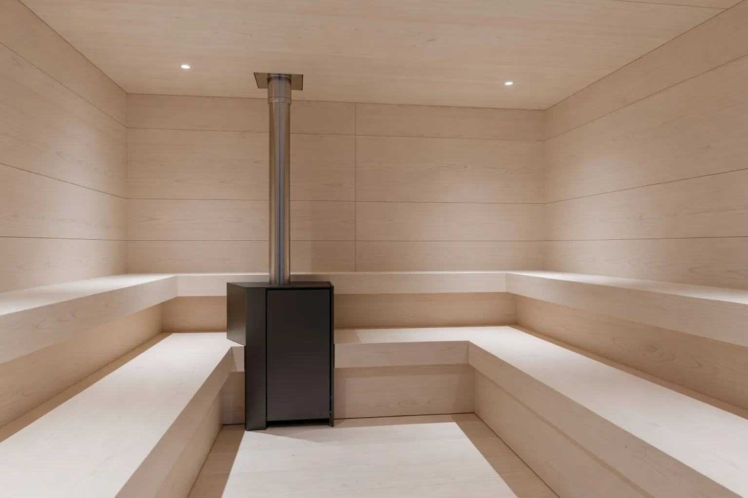 Intérieur de banya blanche moderne avec bois clair poncé et poêle fermé à cheminée